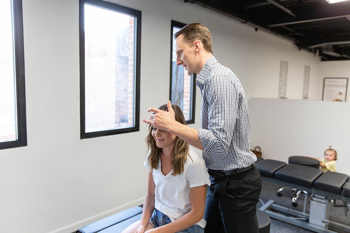chiropractic adjustment for migraine headaches by Kilby Rech at Thrive Family Chiropractic